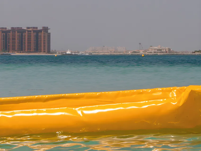 Floating oil boom on coastal water for oil spill containment